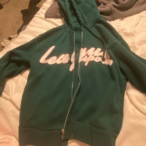 green and pink zip up from H&M. size M